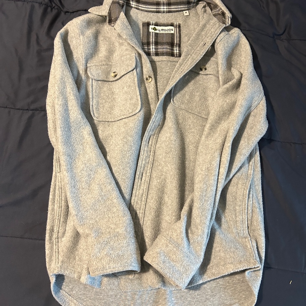 Very warm cover up. Extra layer on top of a flannel for drip purposes only.